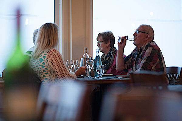 Guests dining at Georgie's Restaurant at the Anchor Inn Hotel