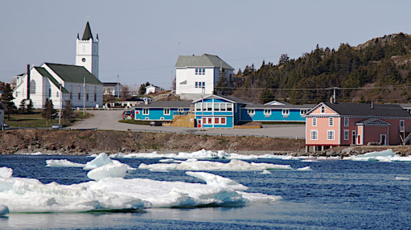 Iceberg in front of the Anchor Inn Hotel in Twillingate