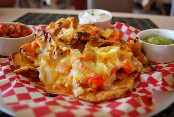 The Anchor Inn Hotel's Nachos with kettle fried chips, peppers and cheese, served with sour cream, served at Captain's Pub.