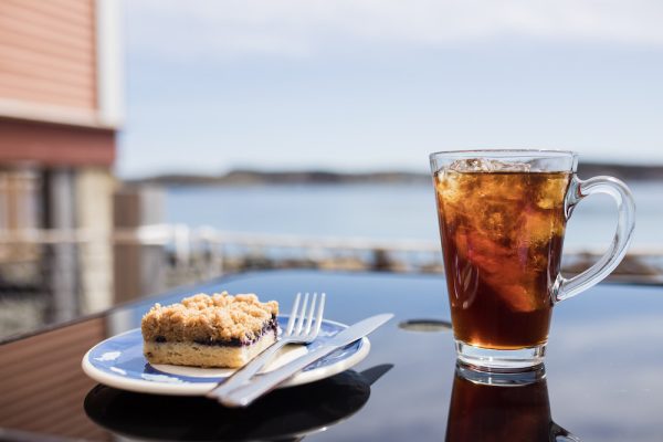 Coffee and treats on the patio at the Blue Barrel Gallery Café at Hodge Premises in Twillingate