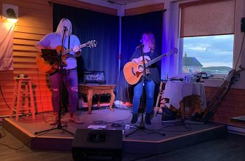 Jackie Sullivan and Karla Pilgrim perform at Captain's Pub in Twillingate